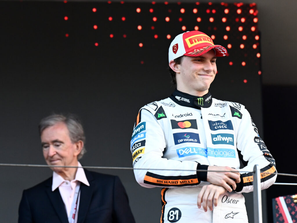 McLaren driver Oscar Piastri standing on the podium at the 2025 Monaco Grand Prix