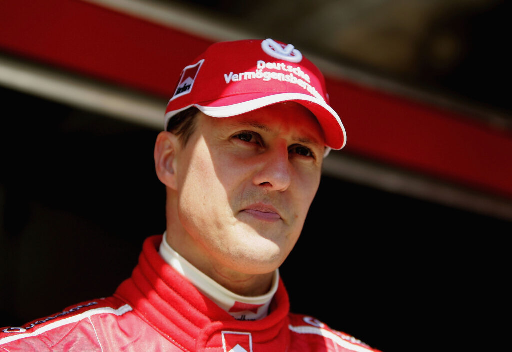 Michael Schumacher of Ferrari looks on during practice for the 2005 San Marino F1 Grand Prix at Imola
