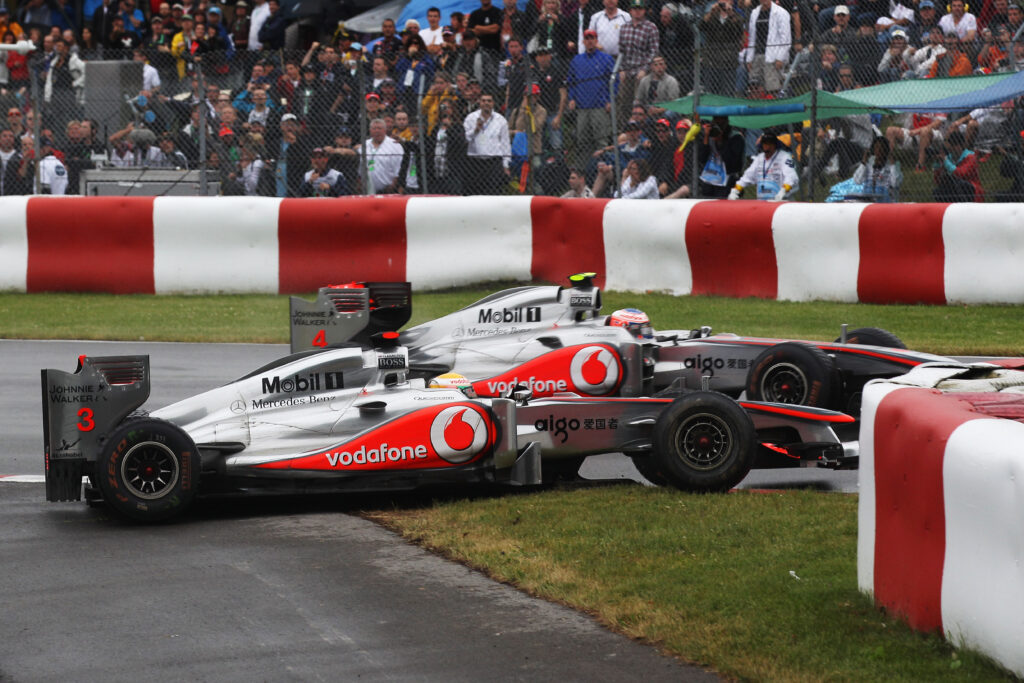 Lewis Hamilton collides with Jenson Button in 2011 Canadian GP.