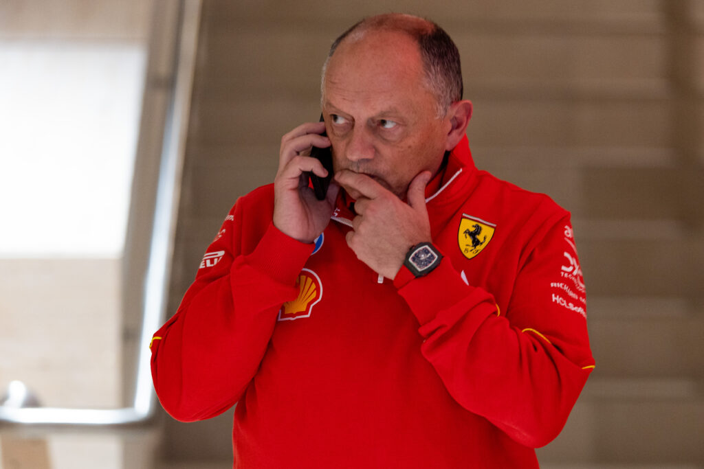 Ferrari boss Fred Vasseur on the phone at the 2024 Qatar Grand Prix
