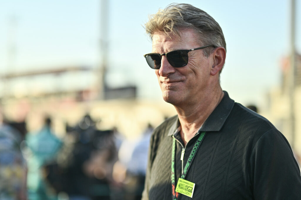 Graeme Lowdon of Cadillac looks on in the F1 paddock