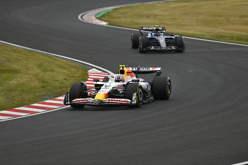 Isack Hadjar leads Carlos Sainz at Japanese GP 2025.