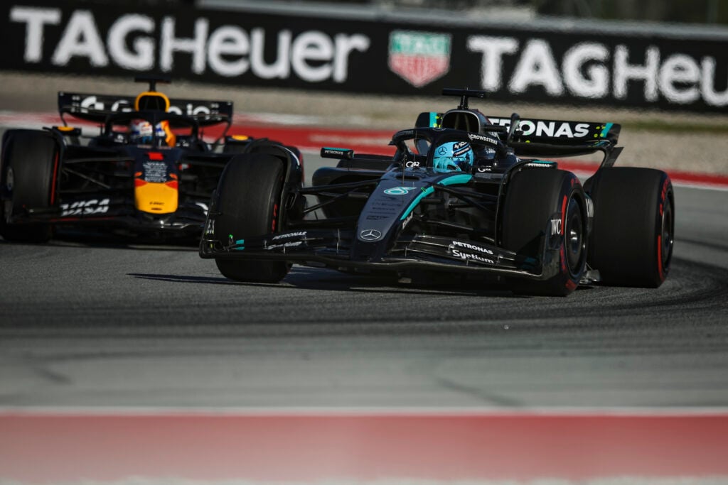 Mercedes driver George Russell and Red Bull Racing driver Max Verstappen on track at the Spanish Grand Prix