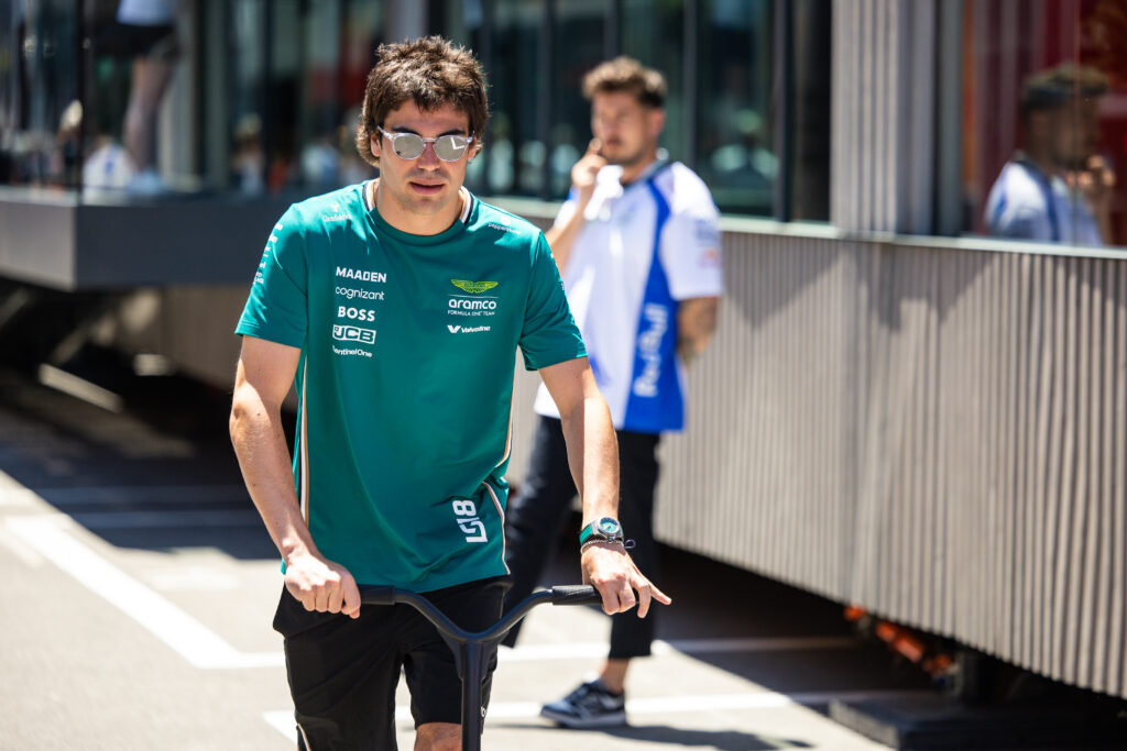 Lance Stroll of Aston Martin travelling through the paddock at the 2025 Spanish Grand Prix