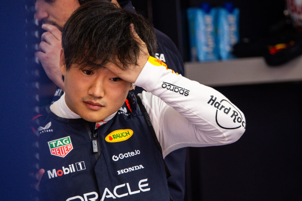 Red Bull driver Yuki Tsunoda gets ready in the garage during practice for the 2025 F1 Spanish Grand Prix