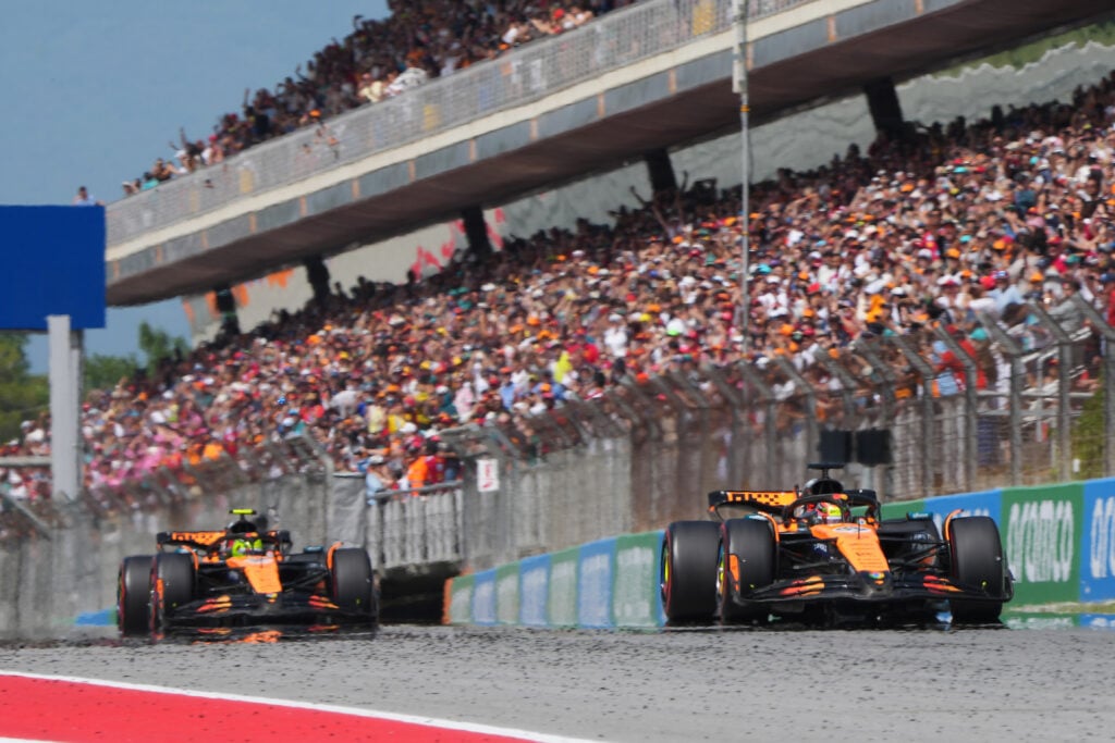 Oscar Piastri leads Lando Norris in the 2025 Spanish Grand Prix.