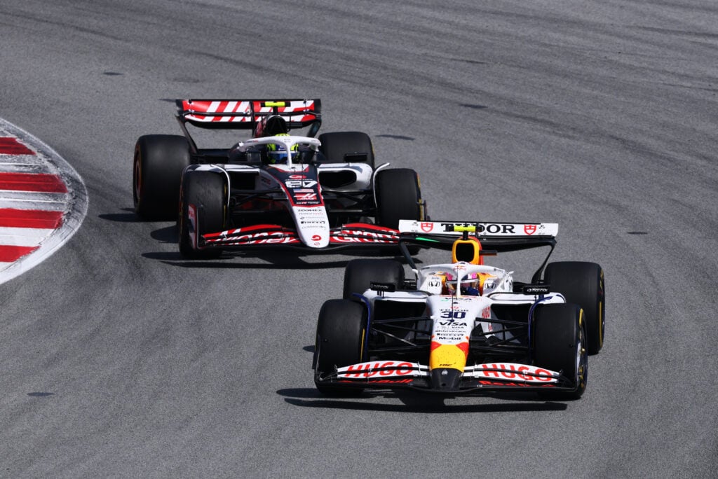 Haas driver Oliver Bearman follows Liam Lawson of Racing Bulls during the 2025 F1 Spanish Grand Prix