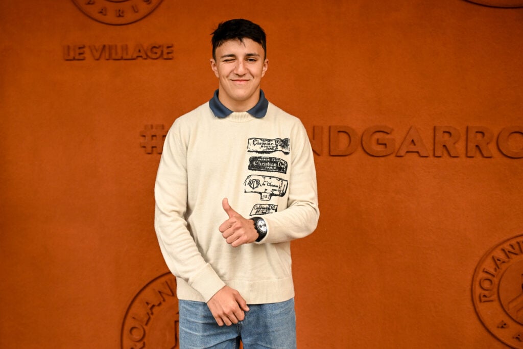 Racing Bulls F1 driver Isack Hadjar poses for a photo