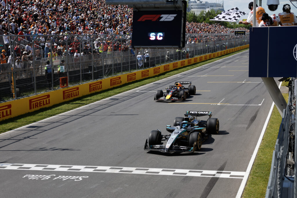 Mercedes driver George Russell crossing the finish line at the 2025 F1 Canadian Grand Prix ahead of Red Bull driver Max Verstappen