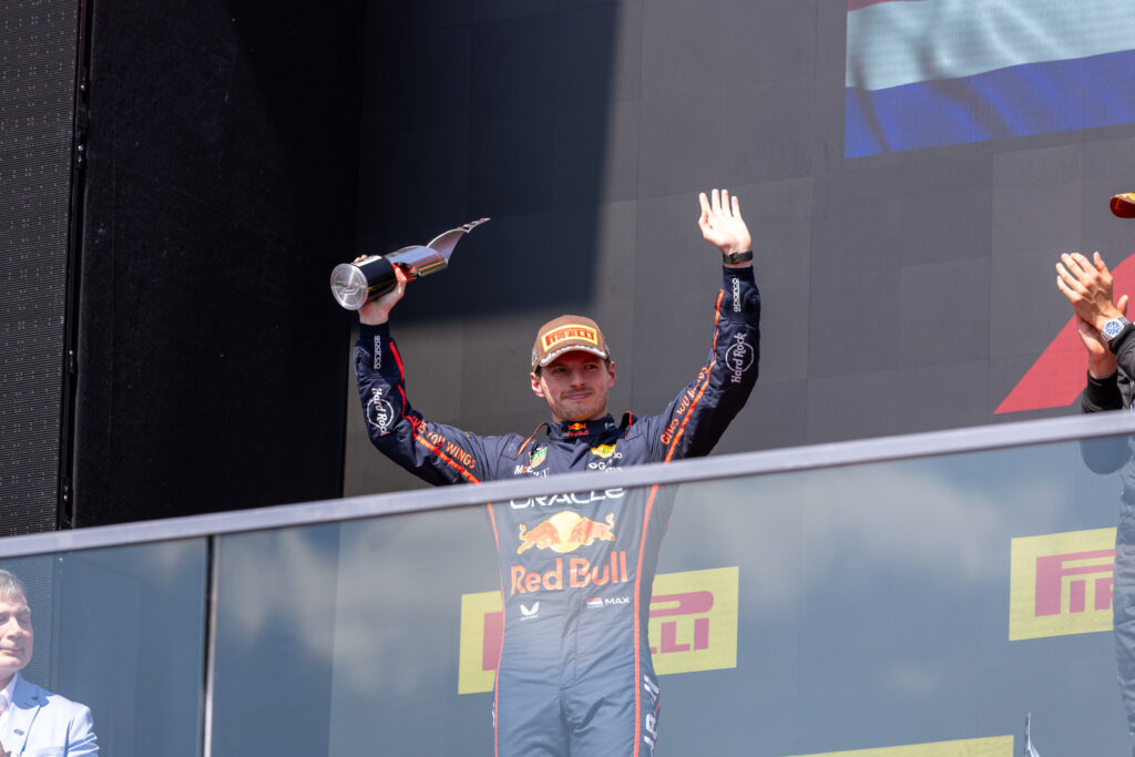 Red Bull Racing driver Max Verstappen celebrating on the podium at the Canadian Grand Prix