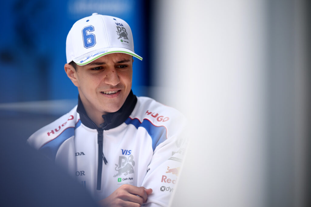 Isack Hadjar of Racing Bulls reacts in the F1 paddock