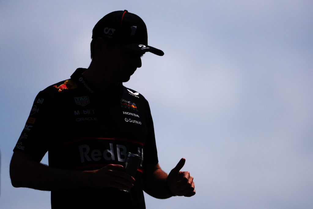 Max Verstappen of Red Bull gestures in the F1 paddock