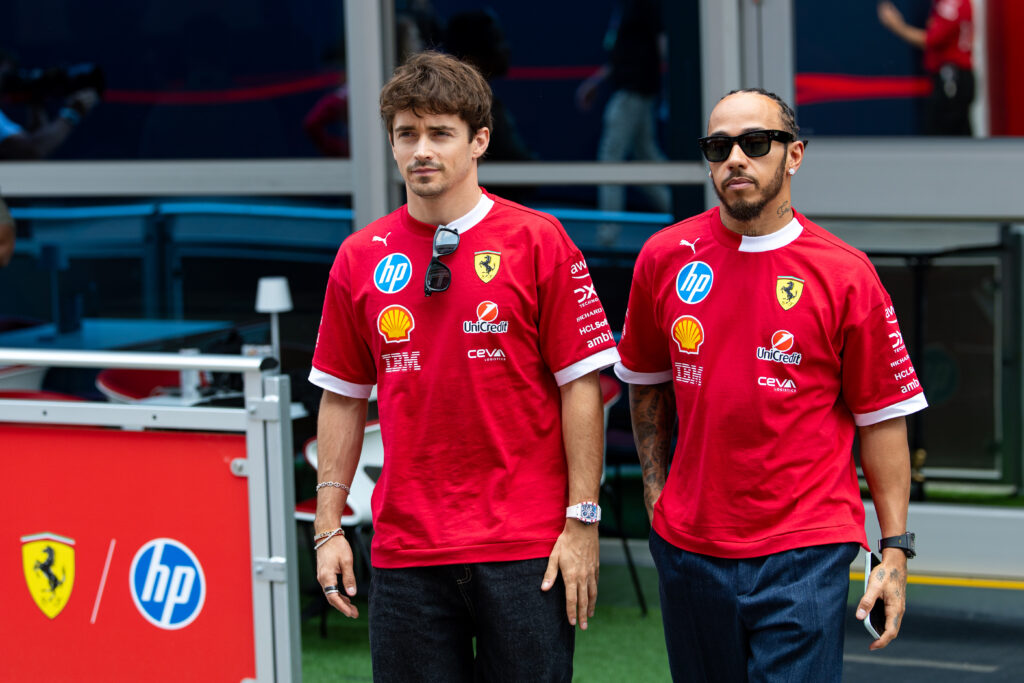 Ferrari drivers Charles Leclerc and Lewis Hamilton in the 2025 F1 Canadian Grand Prix paddock