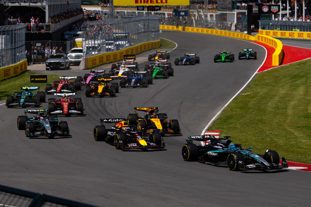 Mercedes rookie Andrea Kimi Antonelli battles Oscar Piastri of McLaren at the start of the 2025 F1 Canadian Grand Prix