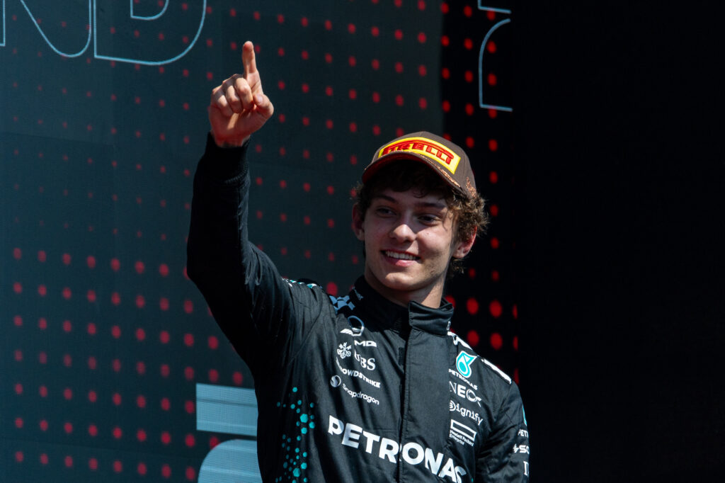 Kimi Antonelli of Mercedes celebrates on the F1 podium