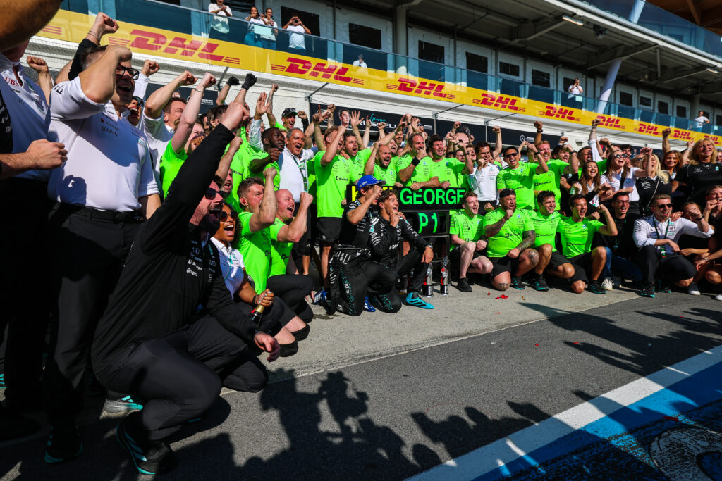 Mercedes F1 team celebrating George Russell's victory at the 2025 Canadian Grand Prix