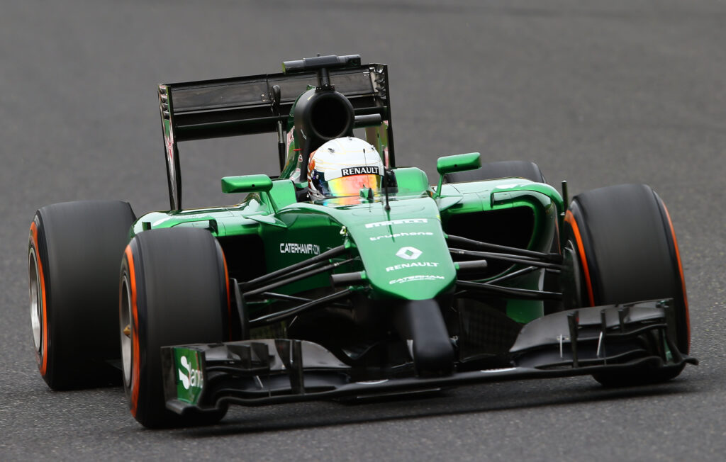 Kamui Kobayashi racing for Caterham F1 in 2014.