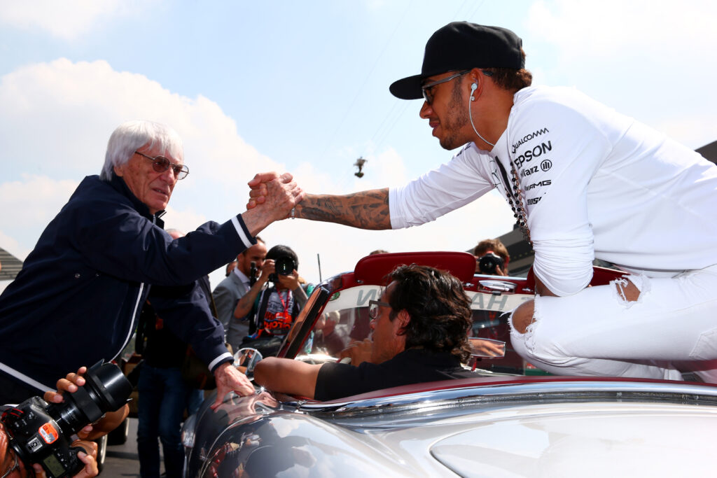Bernie Ecclestone greets Lewis Hamilton at the Mexico City Grand Prix