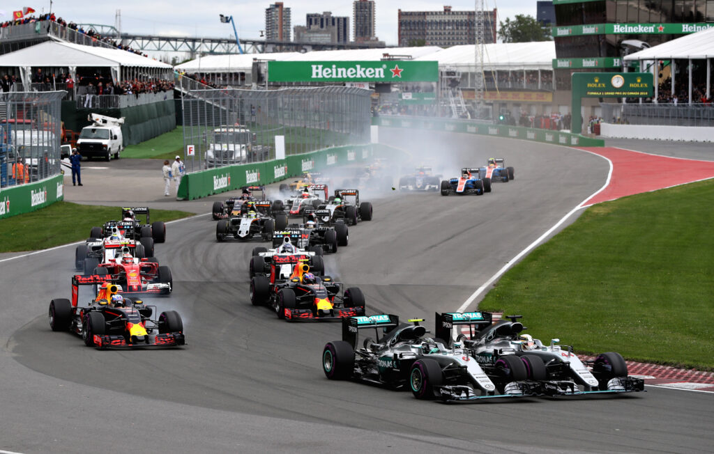 Nico Rosberg fights Lewis Hamilton for the lead of the 2016 F1 Canadian Grand Prix