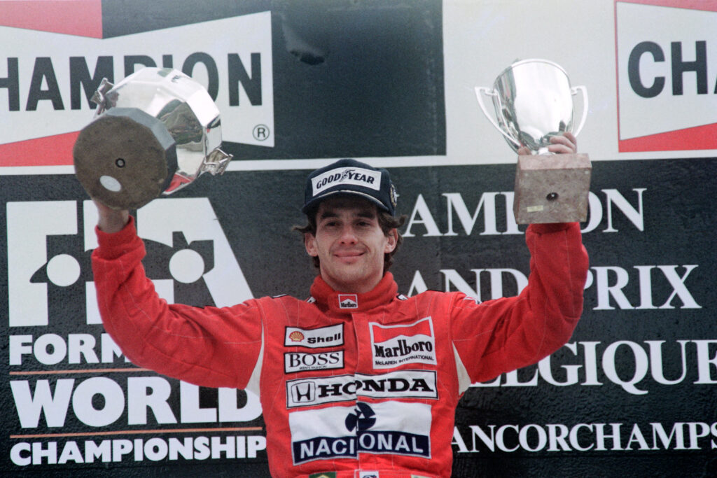 Ayrton Senna on the podium at the 1989 Belgian Grand Prix