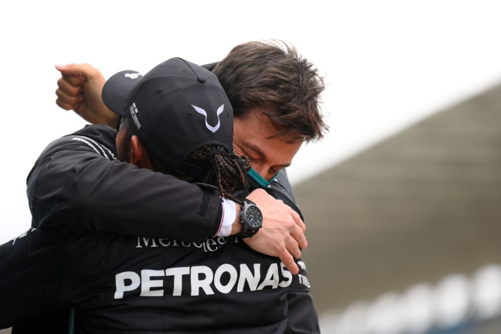 Toto Wolff of Mercedes embraces Lewis Hamilton