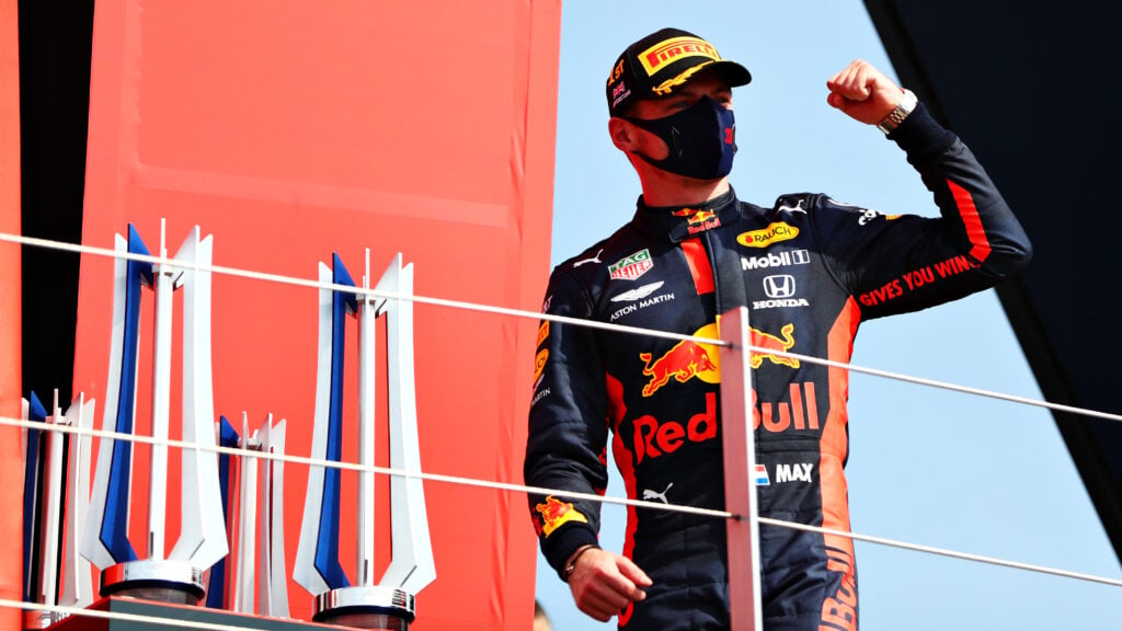 Max Verstappen celebrating on the podium of the 2020 70th Anniversary Grand Prix.