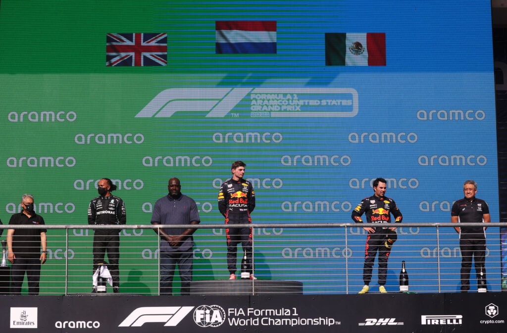 Max Verstappen, Lewis Hamilton and Sergio Perez on the podium after the 2021 United States Grand Prix.