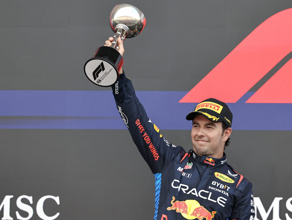 Sergio Perez celebrates on the F1 podium