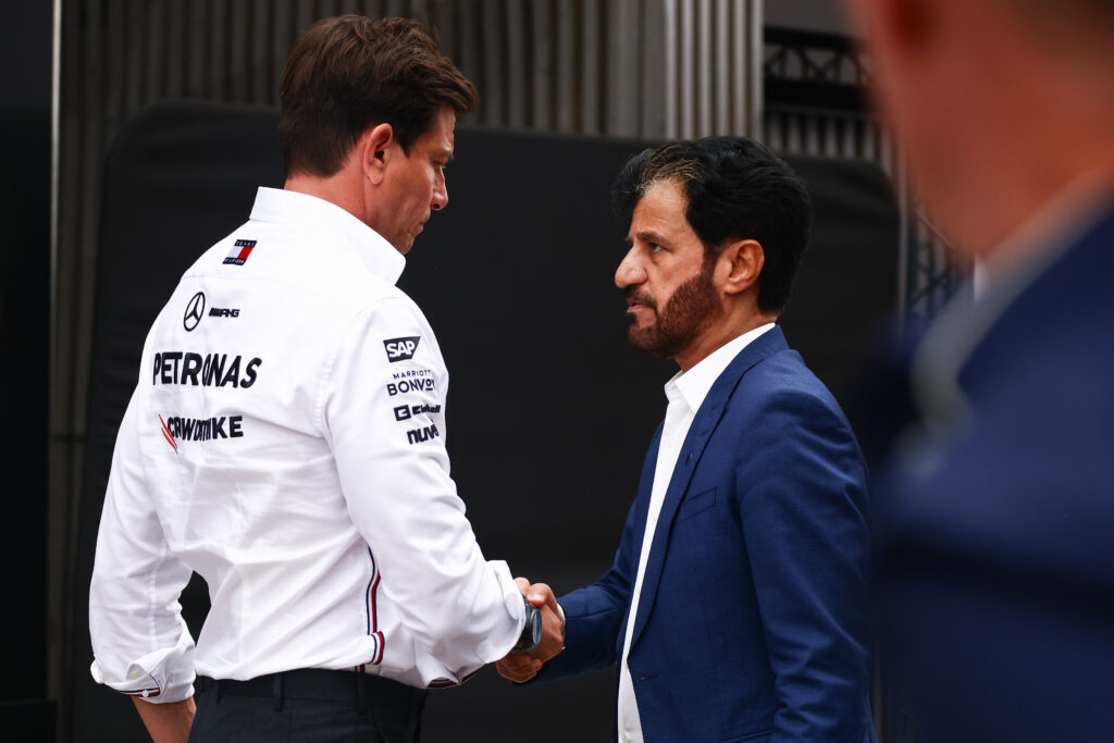 Mercedes team principal Toto Wolff shaking hands with FIA president Mohammed Ben Sulayem at the Hungarian Grand Prix