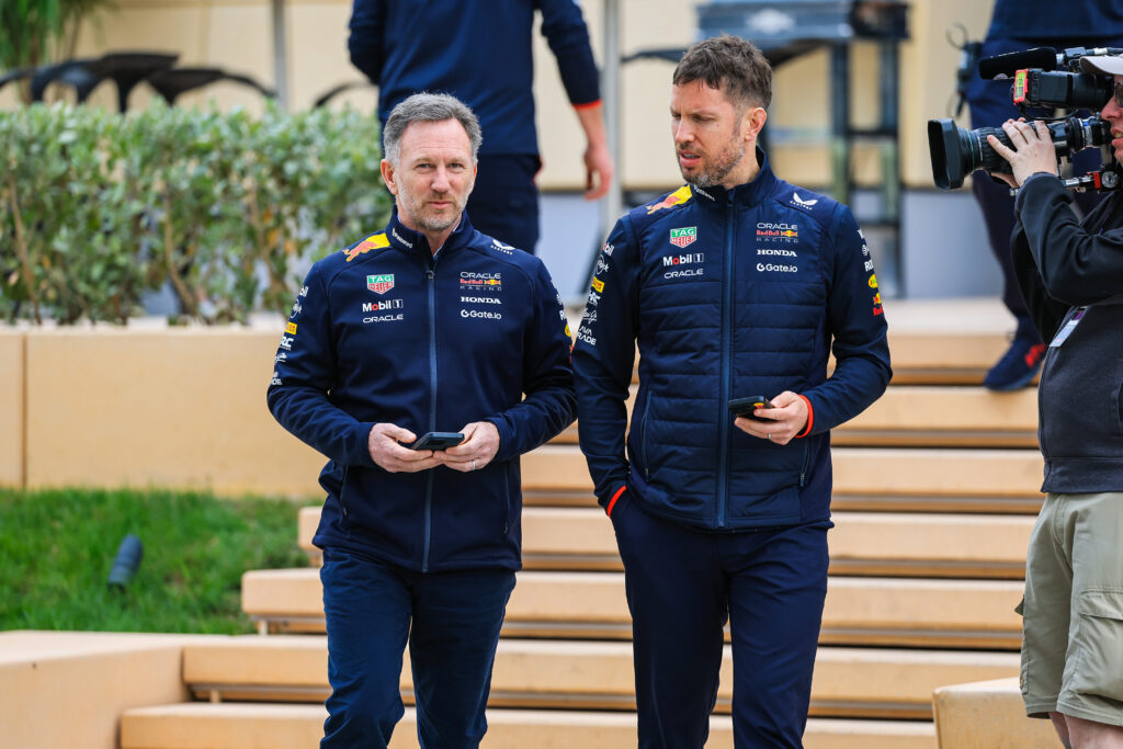 Christian Horner and Paul Smith walk in the F1 paddock
