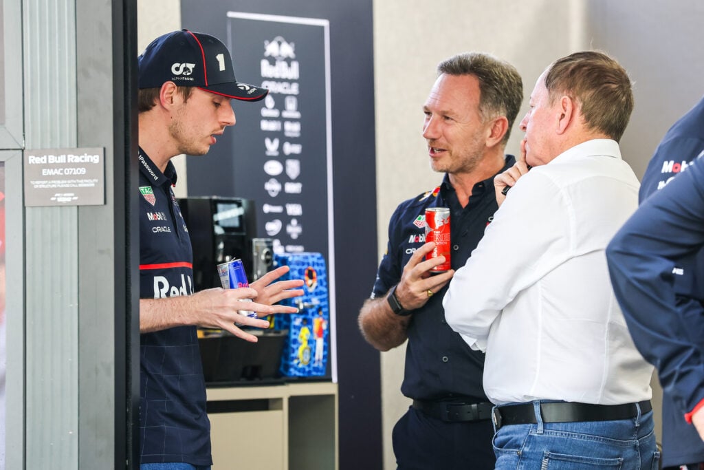 sacked Red Bull team principal Christian Horner speaks to Max Verstappen and Martin Brundle in the 2025 F1 Australian Grand Prix paddock