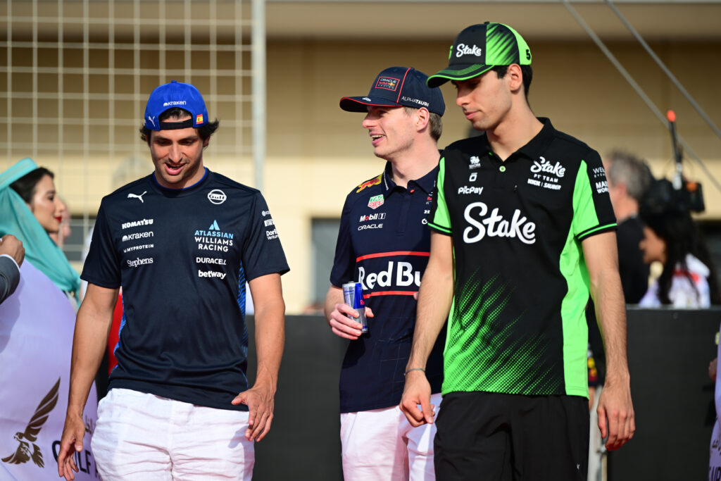 Max Verstappen of Red Bull speaks to Carlos Sainz of Williams and Gabriel Bortoleto of Sauber