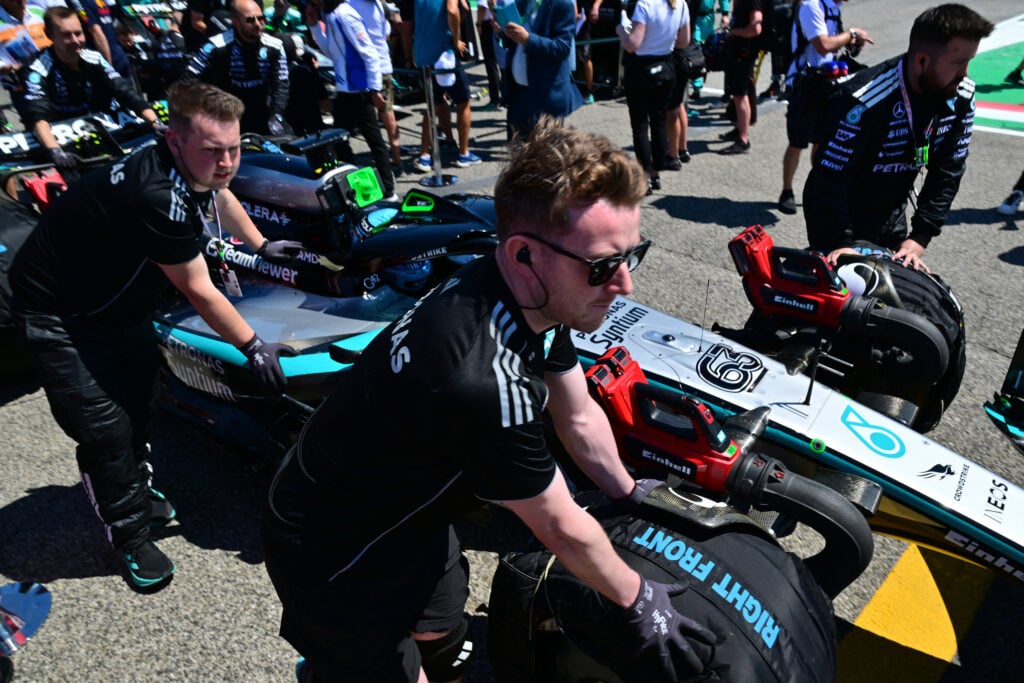 Mercedes engineers preparing George Russell's car ahead of the 2025 Emilia-Romagna Grand Prix.