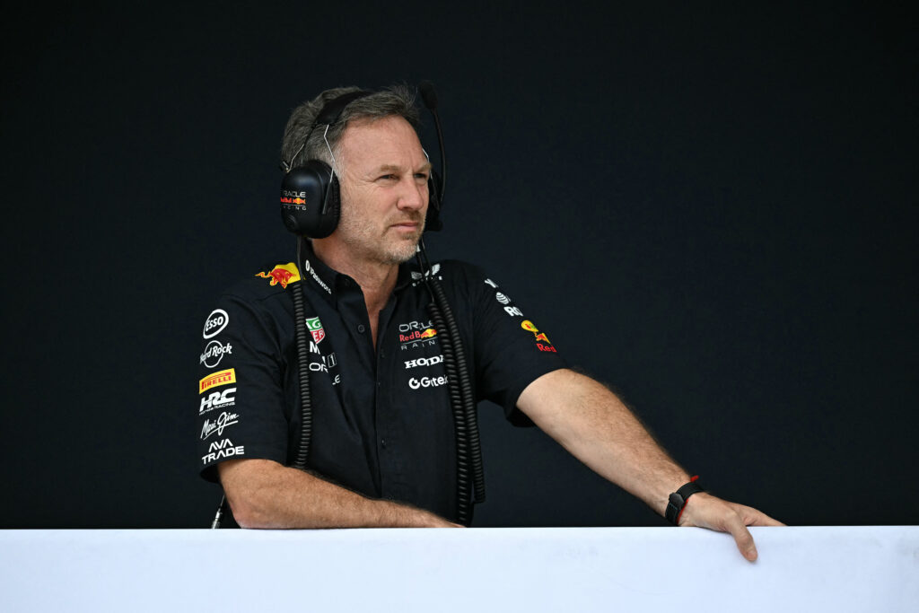 Red Bull team principal Christian Horner stands over the pit lane at the 2025 F1 Monaco Grand Prix