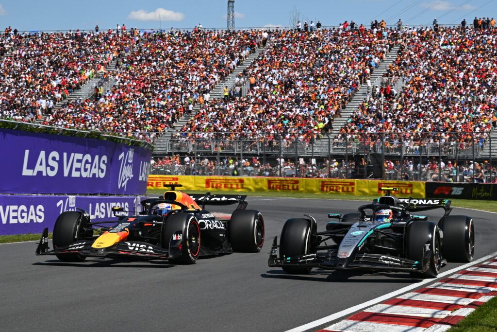 Red Bull driver Max Verstappen on track with Andrea Kimi Antonelli of Mercedes during the 2025 F1 Canadian Grand Prix