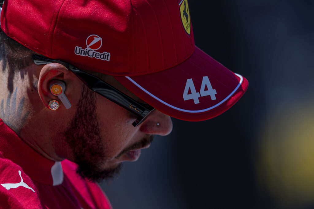 Lewis Hamilton of Ferrari looks on