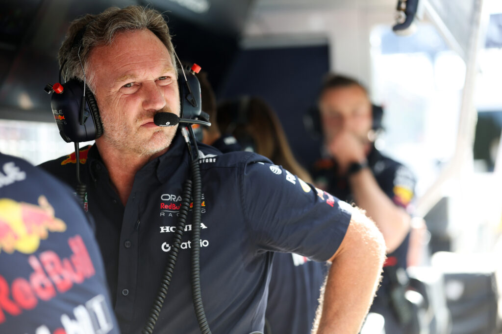Red Bull Racing team principal Christian Horner sitting on the pit wall at the Austrian Grand Prix