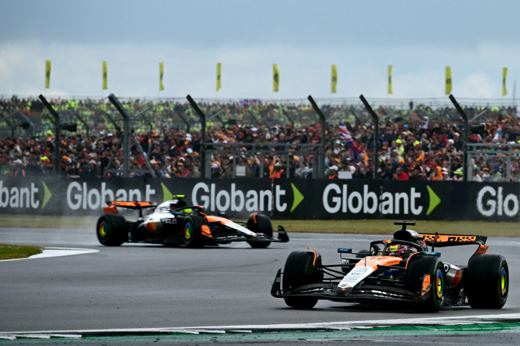 McLaren driver Oscar Piastri leads Lando Norris in the 2025 F1 British Grand Prix at Silverstone
