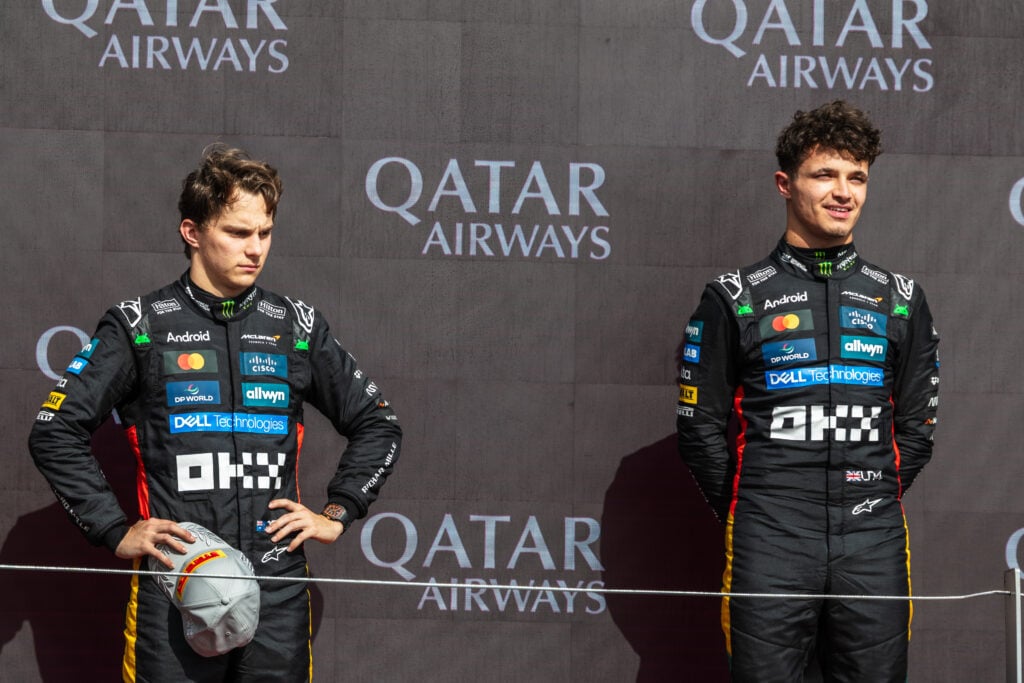 Lando Norris and Oscar Piastri of McLaren on the 2025 F1 British Grand Prix podium