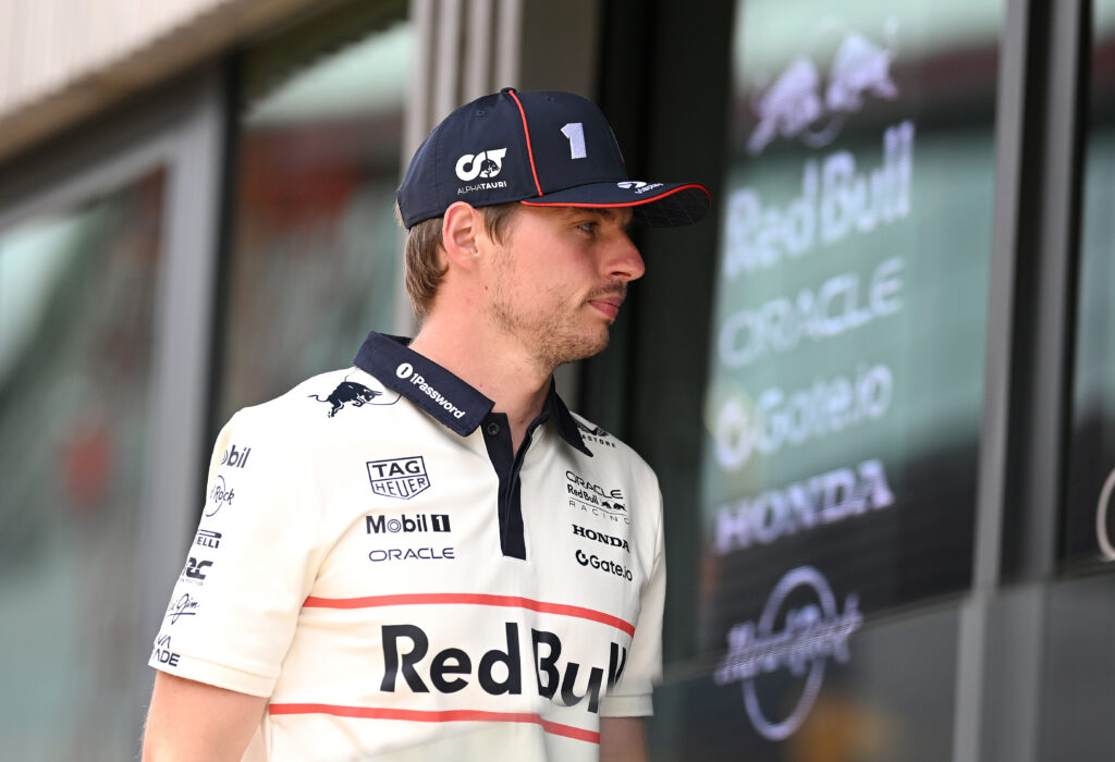 Max Verstappen enters the Red Bull facility in the F1 paddock