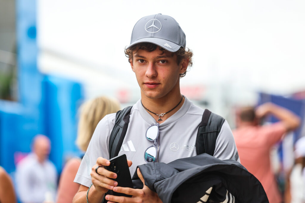 Kimi Antonelli of Mercedes walks in the F1 paddock at the 2025 British Grand Prix