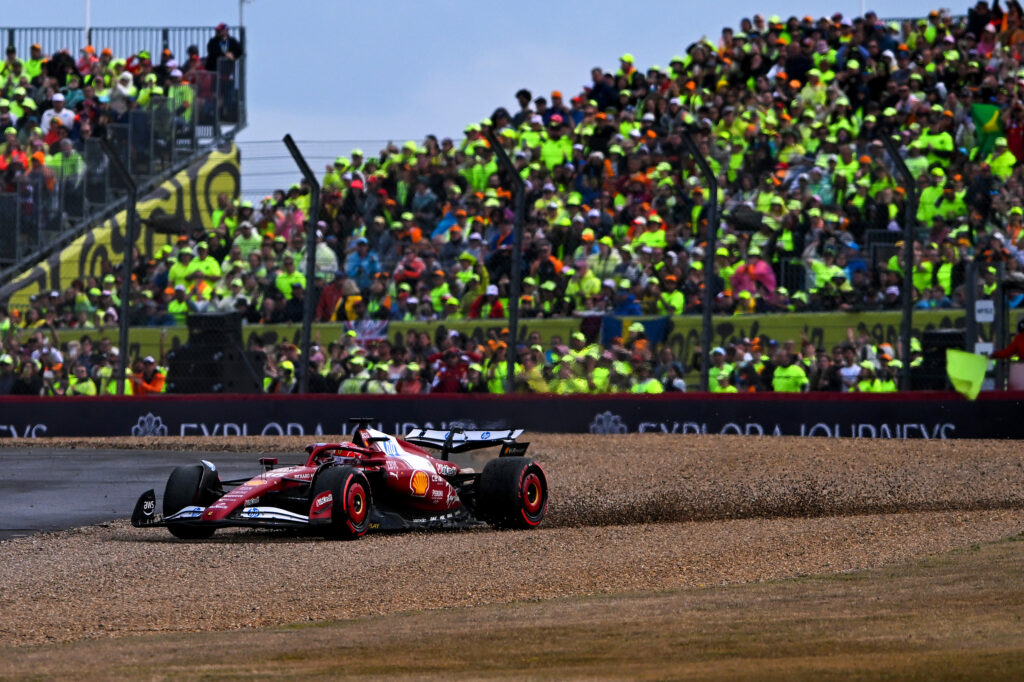 Ferrari driver Charles Leclerc runs through the gravel during the 2025 F1 British Grand Prix