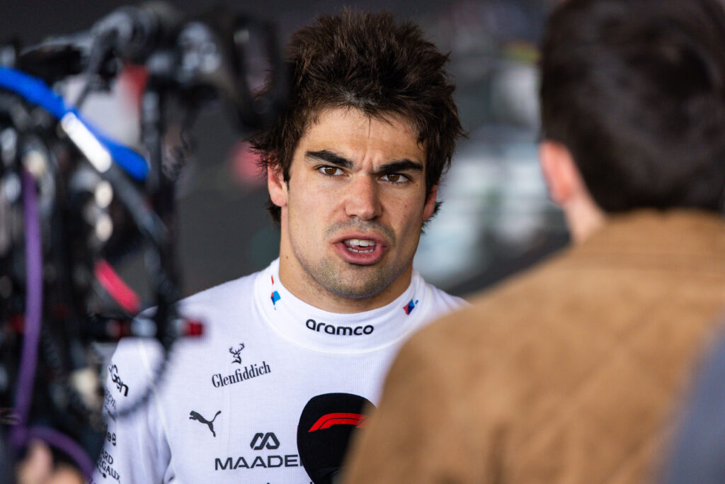 Aston Martin driver Lance Stroll in the media pen at the 2025 British Grand Prix