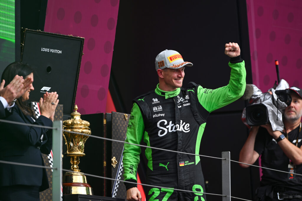 Sauber driver Nico Hulkenberg steps out onto the podium at the 2025 British Grand Prix