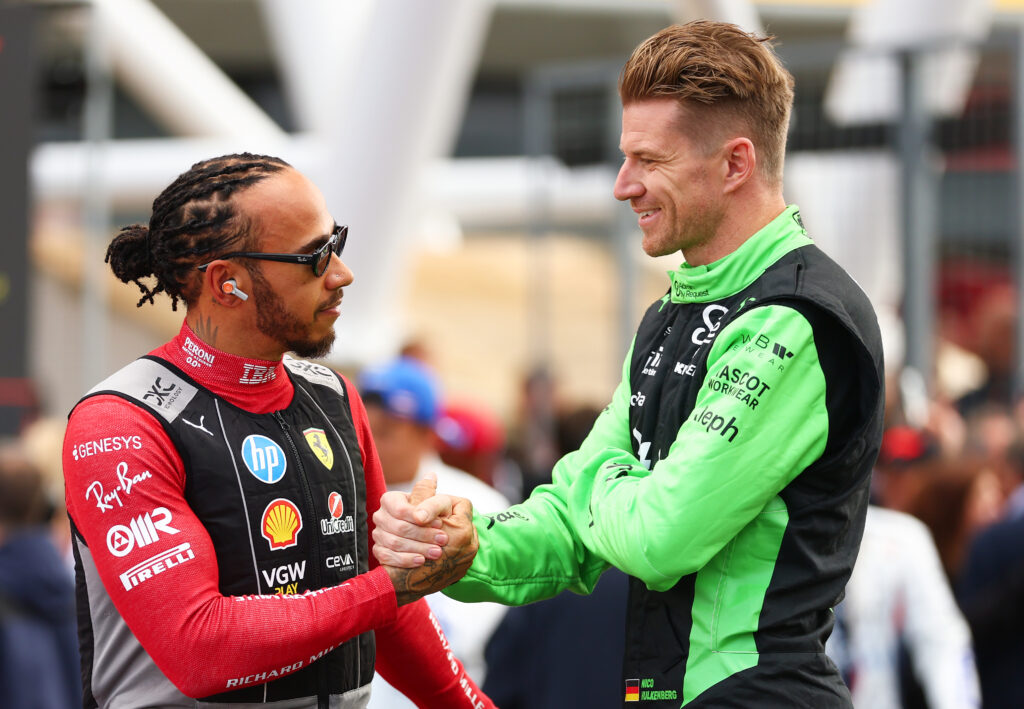 Ferrari driver Lewis Hamilton with Sauber star Nico Hulkenberg on the Silverstone grid before the 2025 F1 British Grand Prix