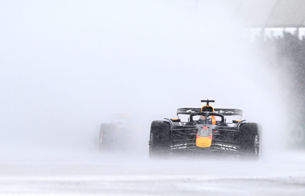 Max Verstappen drives the Red Bull F1 car in the wet