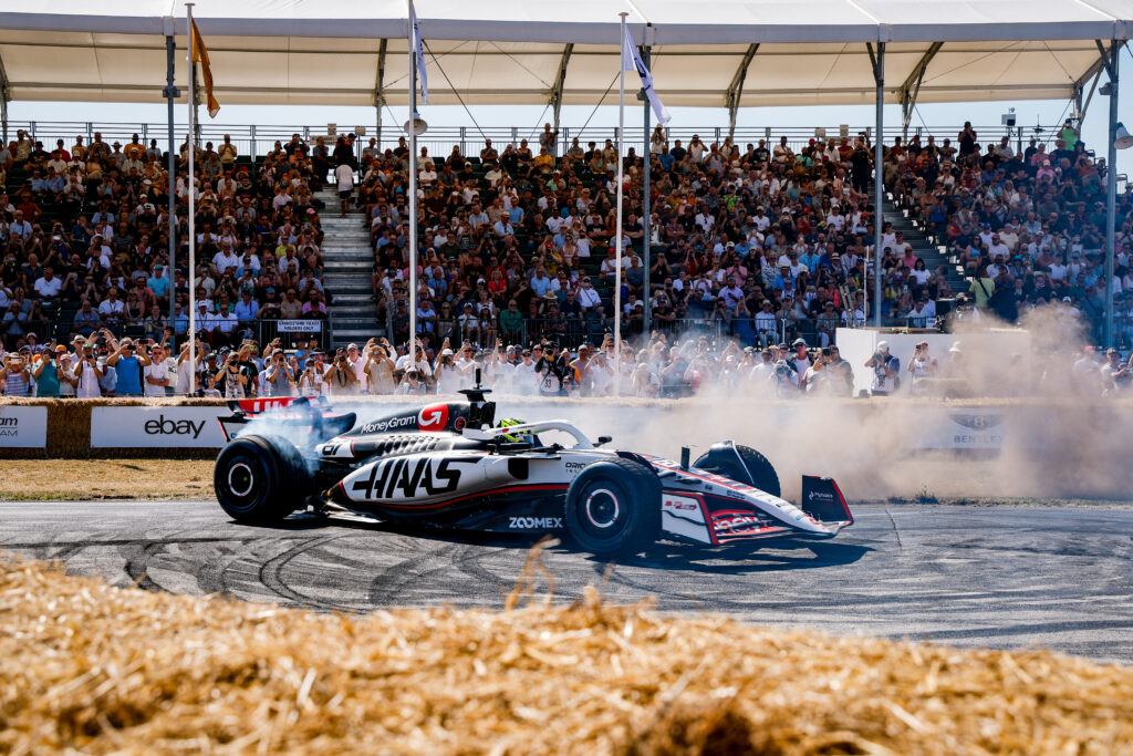 Oliver Beaman entertains the crowd at Goodwood Festival of Speed 2025.
