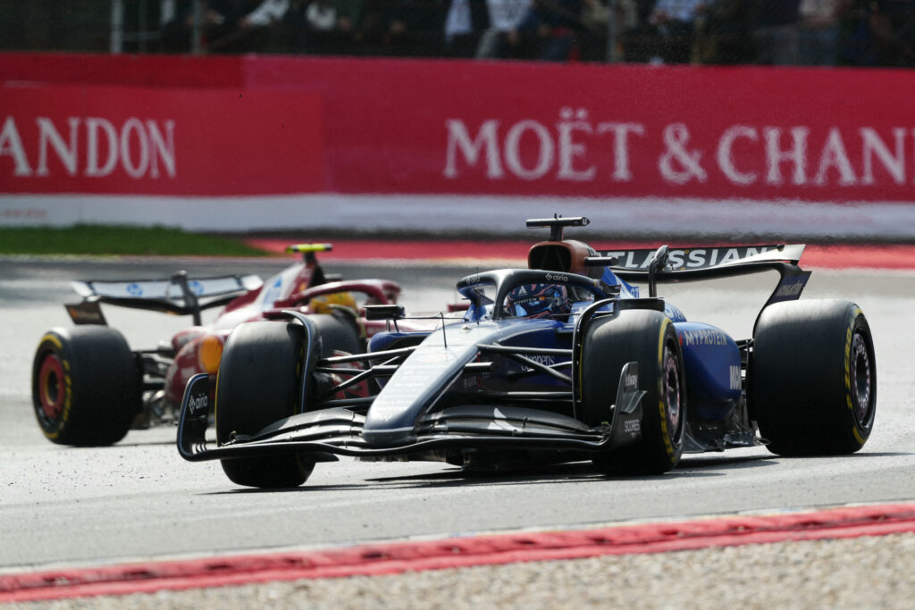 Williams driver Alex Albon on track with Ferrari's Lewis Hamilton in the 2025 F1 Belgian Grand Prix