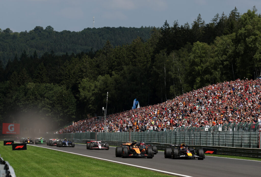 Red Bull driver Max Verstappen overtakes Oscar Piastri of McLaren to lead the F1 Sprint at the 2025 Belgian Grand Prix