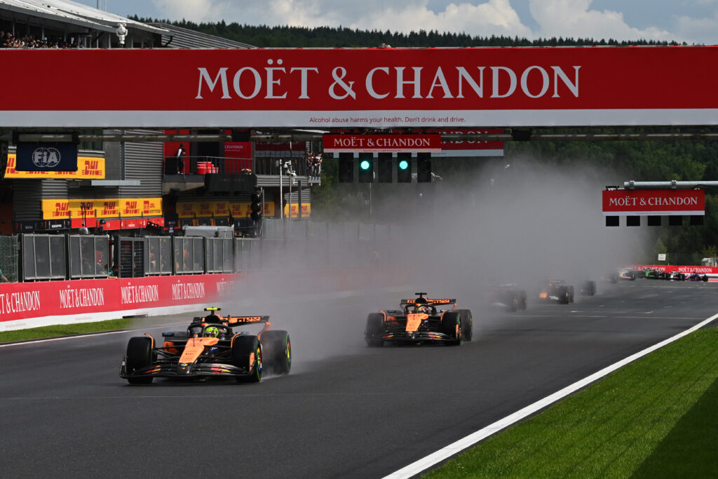 Lando Norris and Oscar Piastri racing at the Belgian Grand Prix